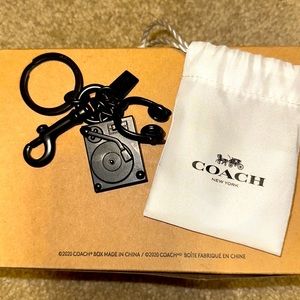 Coach turn table & headphones key ring